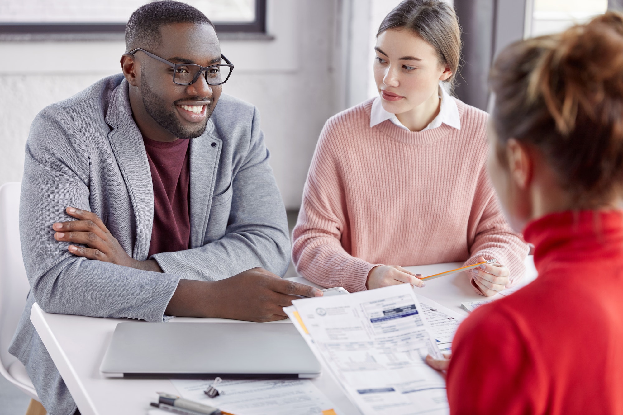 Image of successful multiethnic business people meet together to discuss investment plan, work with